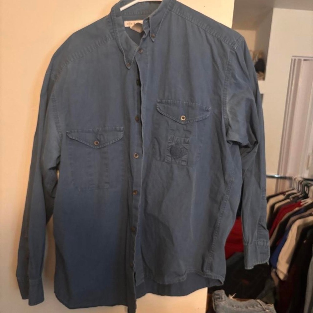 Blue button-up shirt with a relaxed fit